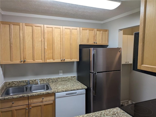 kitchen featuring dishwasher, stainless steel fridge, a textured ceiling, and sink