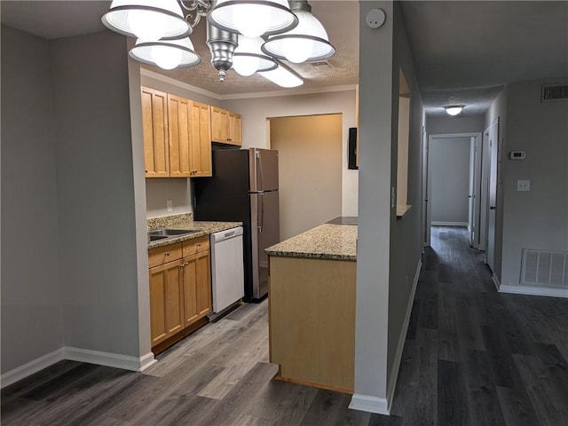 kitchen with light stone countertops, dark hardwood / wood-style flooring, dishwasher, pendant lighting, and a chandelier