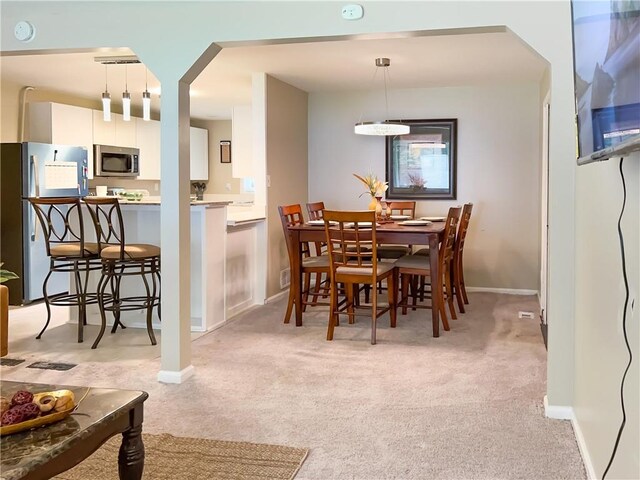 2917 Duncan Pl, Decatur, GA 30034 - dining space with light carpet and arched walkways