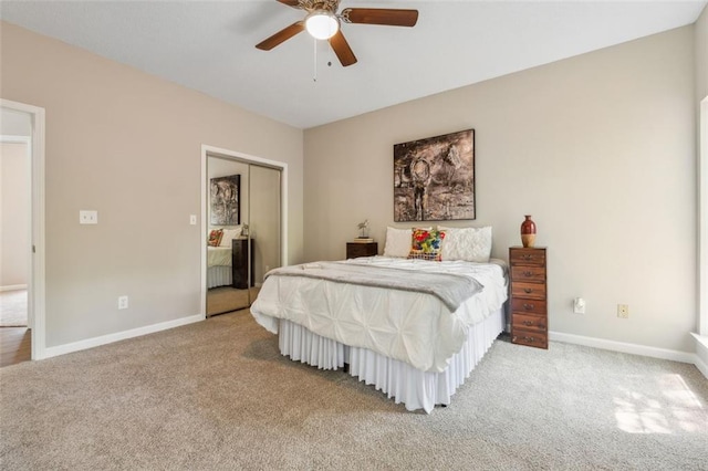 bedroom with carpet flooring, ceiling fan, and a closet