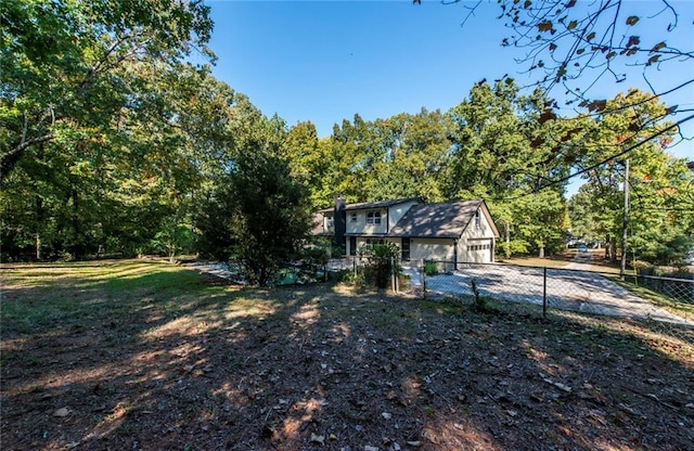 view of yard featuring a garage