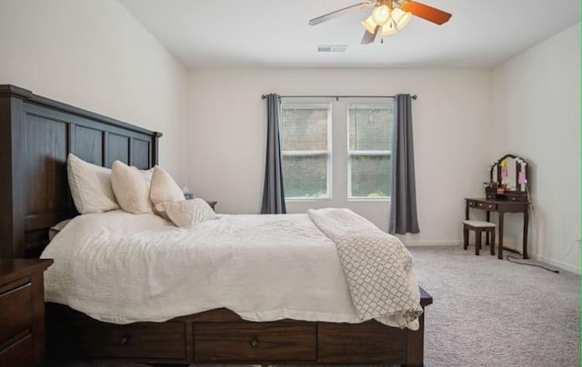 carpeted bedroom featuring ceiling fan