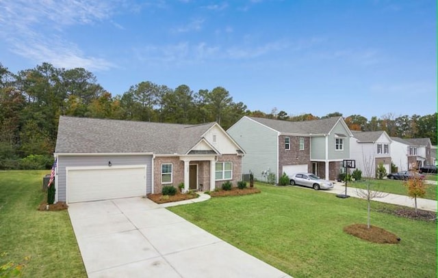 view of front of home featuring a garage and a front lawn