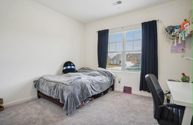 bedroom with light carpet