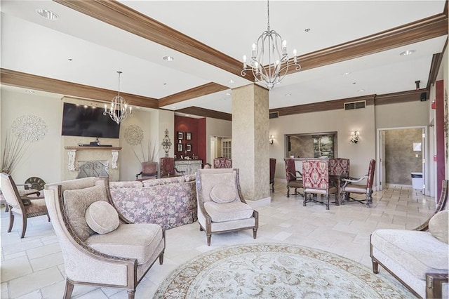 interior space featuring crown molding, visible vents, a notable chandelier, and a fireplace