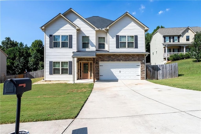 traditional home with a front yard, fence, a garage, stone siding, and driveway