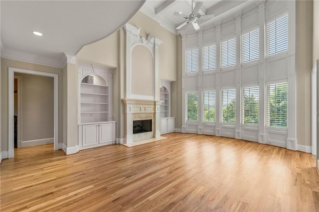 4720 Cliffside Ct, Marietta, GA 30067 - unfurnished living room featuring a high ceiling, ceiling fan, crown molding, a high end fireplace, and baseboards