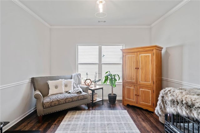 bedroom with visible vents, baseboards, dark wood-type flooring, and ornamental molding