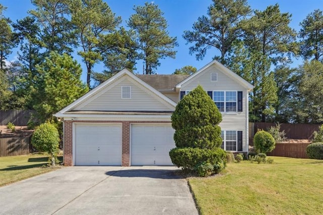 view of front of home featuring a garage and a front lawn