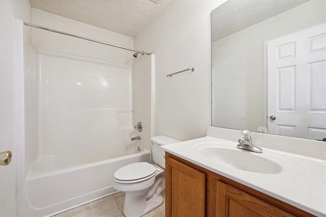 full bathroom with bathtub / shower combination, vanity, a textured ceiling, and toilet