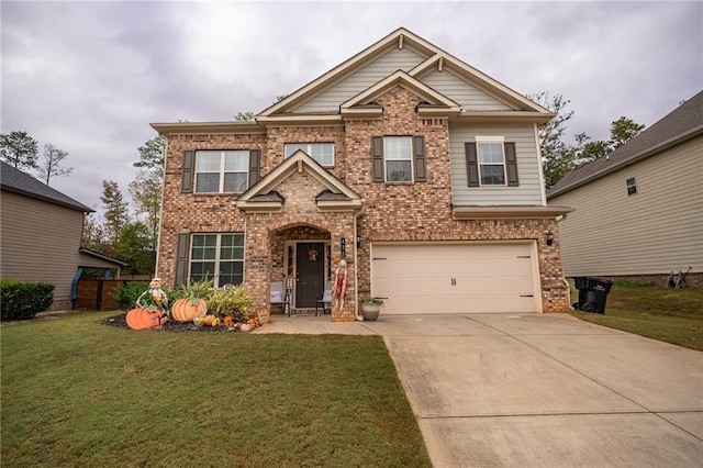 craftsman-style home featuring a garage and a front lawn