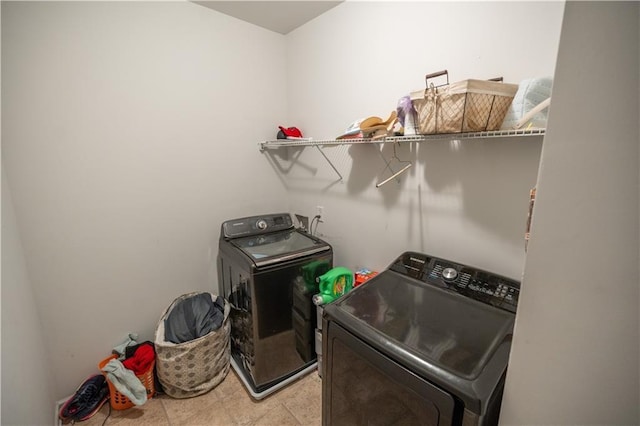 laundry room with washer and clothes dryer