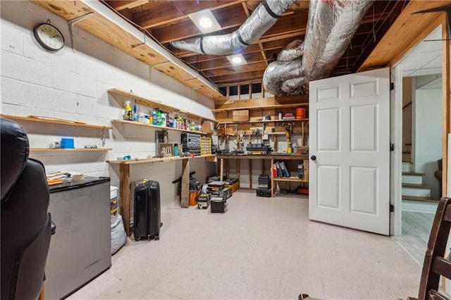 basement with a workshop area