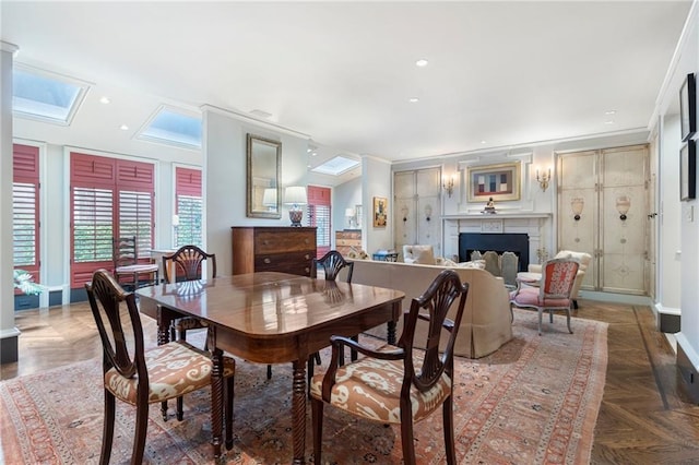 2525 Peachtree Rd Unit 28, Atlanta, GA 30305 - dining room featuring a fireplace, a skylight, and recessed lighting