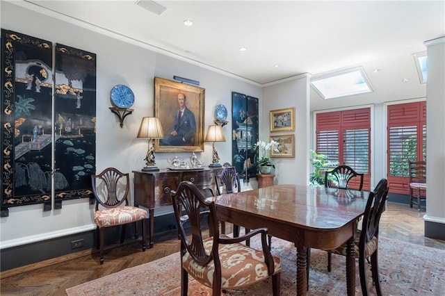 2525 Peachtree Rd Unit 28, Atlanta, GA 30305 - dining space with a skylight, crown molding, and recessed lighting