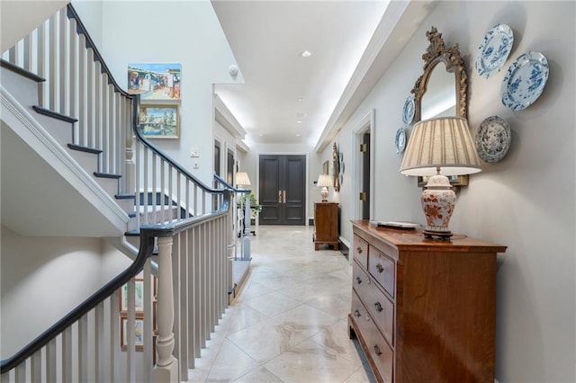 2525 Peachtree Rd Unit 28, Atlanta, GA 30305 - entrance foyer with stairway, light tile patterned flooring, and recessed lighting