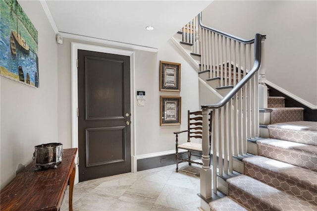 2525 Peachtree Rd Unit 28, Atlanta, GA 30305 - entrance foyer featuring stairs and baseboards