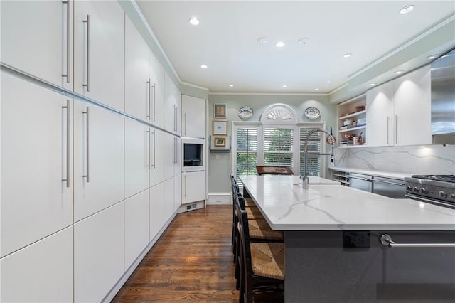 2525 Peachtree Rd Unit 28, Atlanta, GA 30305 - kitchen with open shelves, modern cabinets, white cabinetry, dark wood-style floors, and recessed lighting