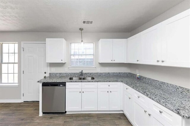 508 Cascade Walk, Mcdonough, GA 30253 - kitchen featuring stainless steel dishwasher, sink, white cabinets, pendant lighting, and light stone counters