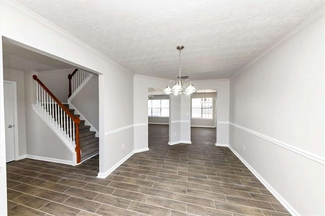 508 Cascade Walk, Mcdonough, GA 30253 - unfurnished dining area featuring a notable chandelier, crown molding, and a textured ceiling