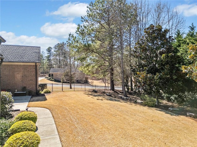 view of yard featuring fence