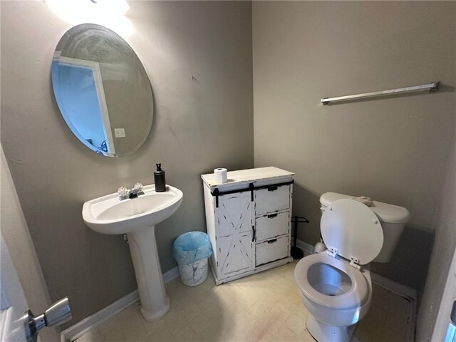 bathroom featuring toilet