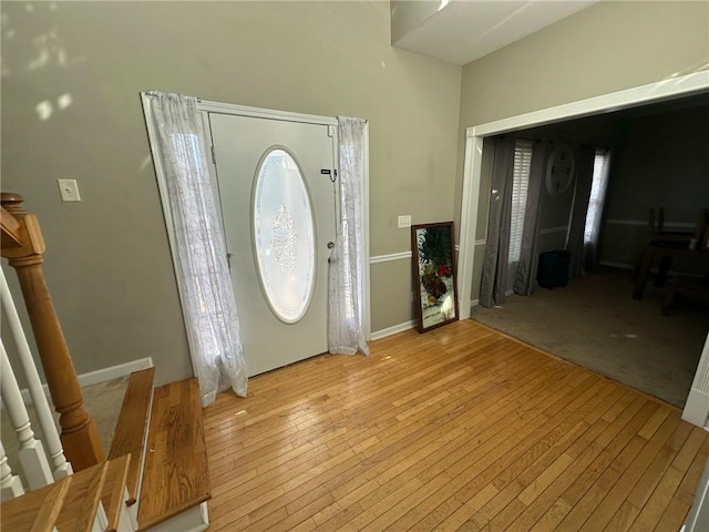 entryway with light hardwood / wood-style flooring