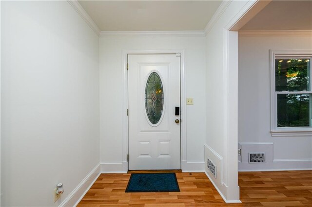 4324 Japonica Ct SW, Lilburn, GA 30047 - unfurnished bedroom with wood finished floors, ornamental molding, ensuite bath, and ceiling fan