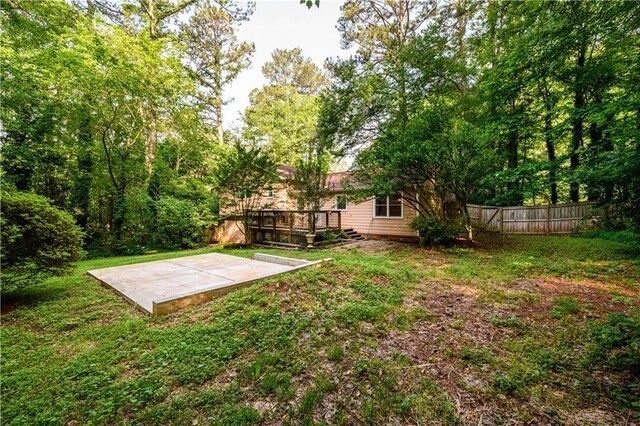 4324 Japonica Ct SW, Lilburn, GA 30047 - back of property featuring a deck and a yard