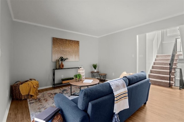 living room featuring crown molding and wood-type flooring