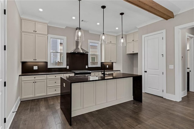 kitchen featuring dark wood-style floors, dark countertops, white cabinets, and stainless steel range oven