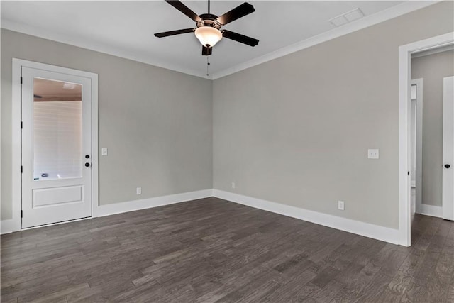 unfurnished room with baseboards, visible vents, a ceiling fan, dark wood-style floors, and ornamental molding