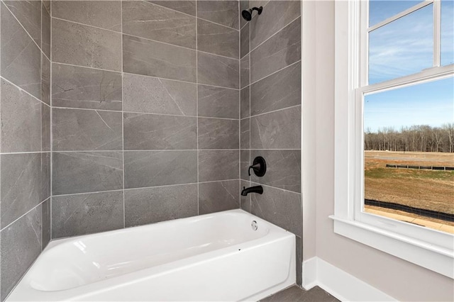 full bathroom with shower / washtub combination