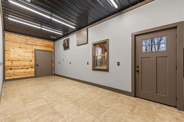 entrance foyer with wood walls