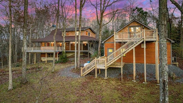 playground at dusk featuring a deck