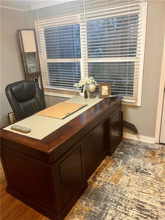 office area with ornamental molding