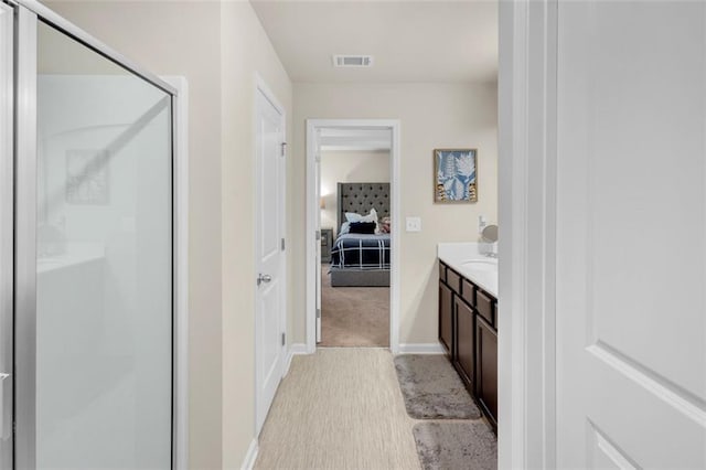 104 Auburn Crossing Way, Auburn, GA 30011 - bathroom featuring a shower stall, ensuite bath, baseboards, and vanity