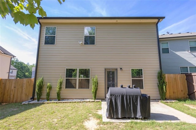 104 Auburn Crossing Way, Auburn, GA 30011 - rear view of property featuring a patio area