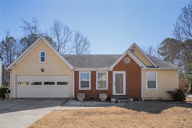 view of front of house with crawl space, driveway, and brick siding