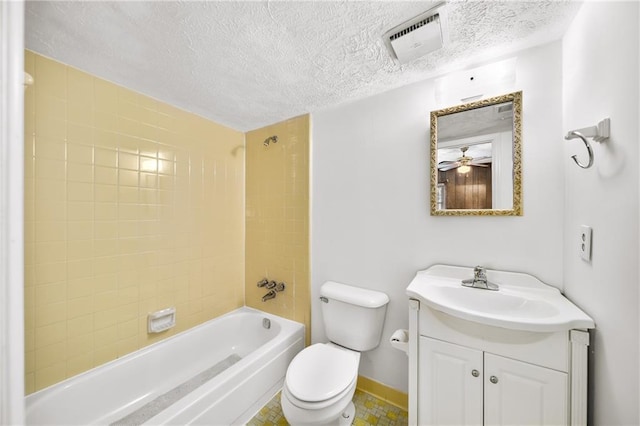 bathroom featuring visible vents, toilet, a textured ceiling, and vanity