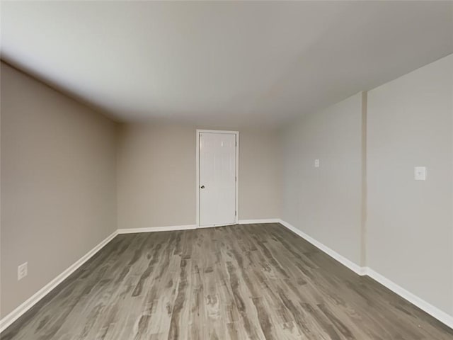 908 Kennesaw Dr, Forest Park, GA 30297 - empty room with wood finished floors and baseboards