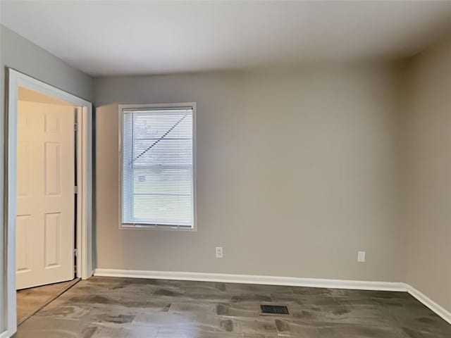 908 Kennesaw Dr, Forest Park, GA 30297 - empty room featuring baseboards and wood finished floors