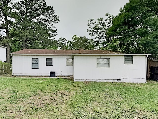 908 Kennesaw Dr, Forest Park, GA 30297 - rear view of house with crawl space, central AC, and a lawn