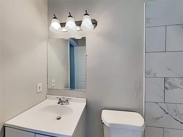 908 Kennesaw Dr, Forest Park, GA 30297 - bathroom with vanity and toilet