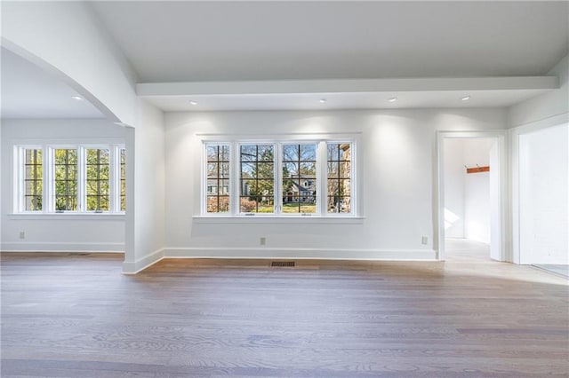 empty room featuring hardwood / wood-style floors