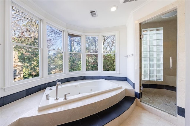 bathroom featuring plus walk in shower, tile patterned flooring, and ornamental molding