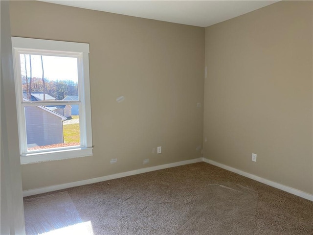 258 Westminster Ct, Winder, GA 30680 - spare room with healthy amount of natural light, carpet, and baseboards