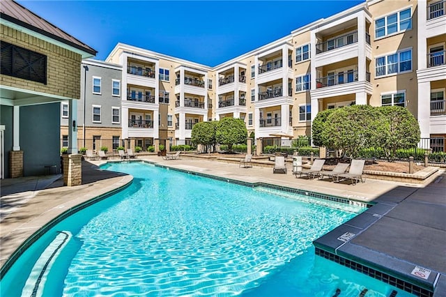 view of pool featuring a patio area