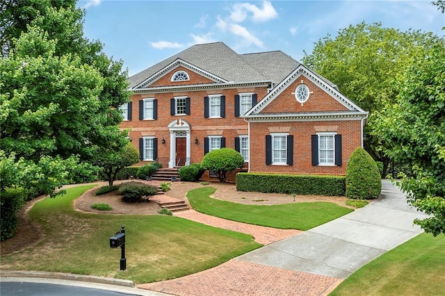 view of front of home featuring a front yard