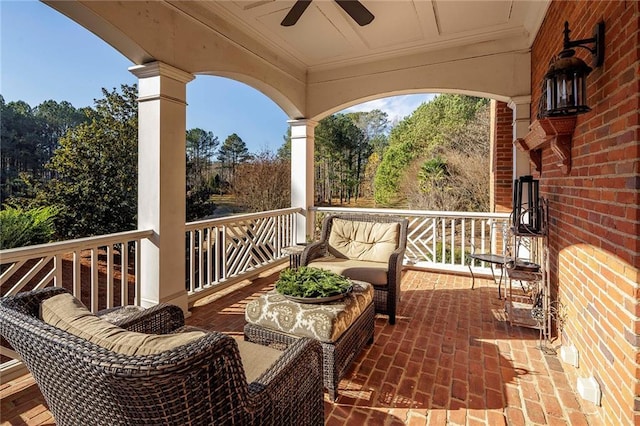 exterior space featuring an outdoor hangout area and ceiling fan